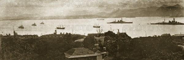 View of ships off Fiji harbour. Panoramic view of Fiji harbour, showing warships belonging to the British Special Service Squadron. Fiji, 21-27 May 1924. Fiji, Pacific Ocean, Oceania.