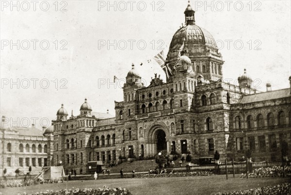 Parliament buildings, Victoria. The union jack flag flies high above grandiose parliament buildings. Victoria, Canada, 21 June-4 July 1924. Victoria, British Columbia, Canada, North America, North America .