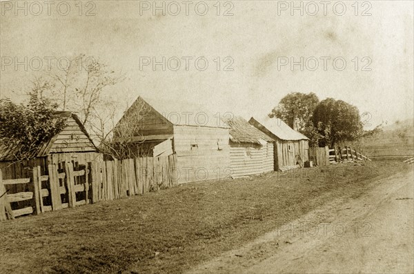 Indooroopilly pocket. Wooden sheds line the road near the Indooroopilly pocket, a tight bend in the river close to the town itself. Indooroopilly, Australia, circa 1890. Indooroopilly, Queensland, Australia, Australia, Oceania.