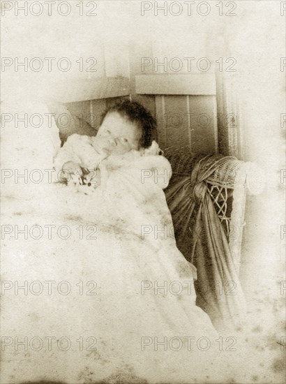 Cubbo' at two weeks, Australia. Portrait of a young baby dressed in a white gown, originally captioned as 'Cubbo' aged two weeks old. Queensland, Australia, 5 August 1890., Queensland, Australia, Australia, Oceania.