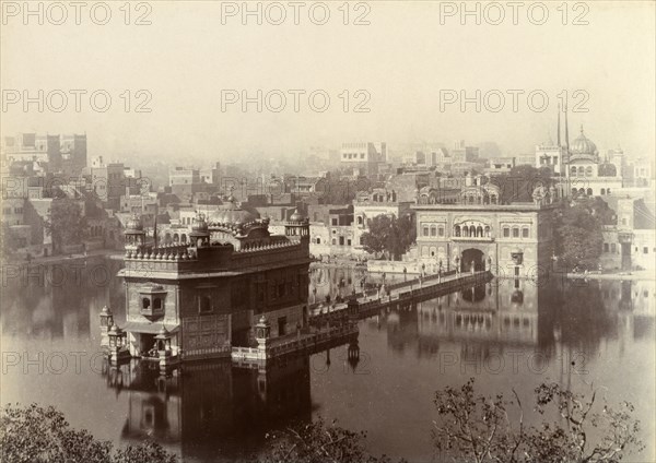 The Harimandir Sahib at Amritsar. A misty pool surrounds the Harimandir Sahib, or Golden Temple, the most sacred gurdwara (Sikh temple) in all of Sikhism. Amritsar, India, circa 1895. Amritsar, Punjab, India, Southern Asia, Asia.