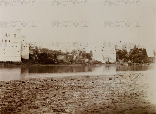 Point Azammur, Morocco. Square buildings flank the water's edge at Point Azammur on the Um er-Rabia river. Azemmour, Morocco, 1898. Azemmour, El Jadida, Morocco, Northern Africa, Africa.