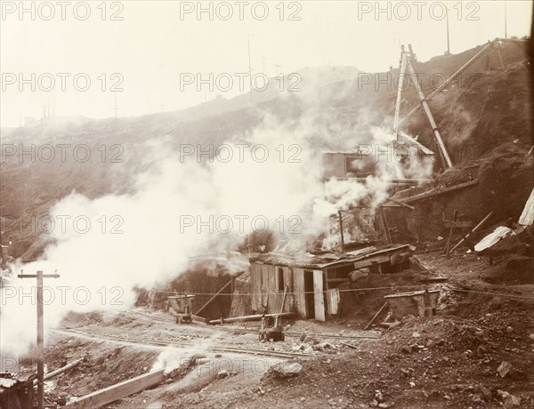 Pumps at the Premier Diamond Mine. Makeshift huts, possibly pump houses, are enveloped in steam at the Premier Diamond Mine. Cullinan, South Africa, circa 1907. Cullinan, Gauteng, South Africa, Southern Africa, Africa.