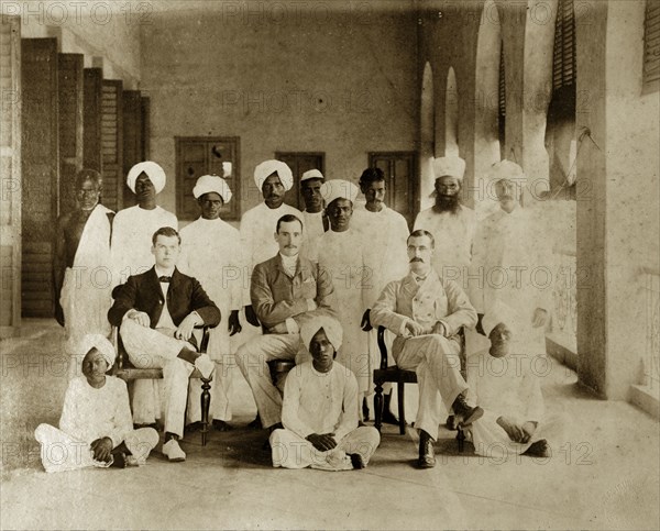 Bank of Bengal 'chummery'. Group portrait of a Bank of Bengal 'chummery' with Indian servants. Calcutta (Kolkata), India, September 1894. Kolkata, West Bengal, India, Southern Asia, Asia.