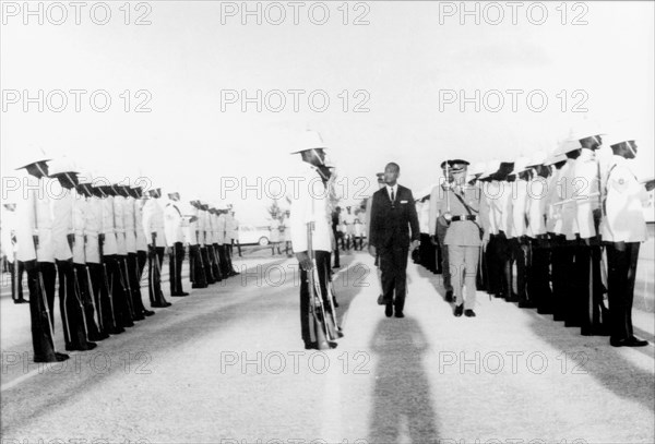 Sir Winston Scott inspects recruits. Sir Winston Scott (1900-1976), the first Barbadian Governor General of Barbados, inspects uniformed police recruits at a passing out parade at the Regional Police Training Centre. Seawell, Barbados, 1967. Seawell, Christ Church, Barbados, Caribbean, North America .