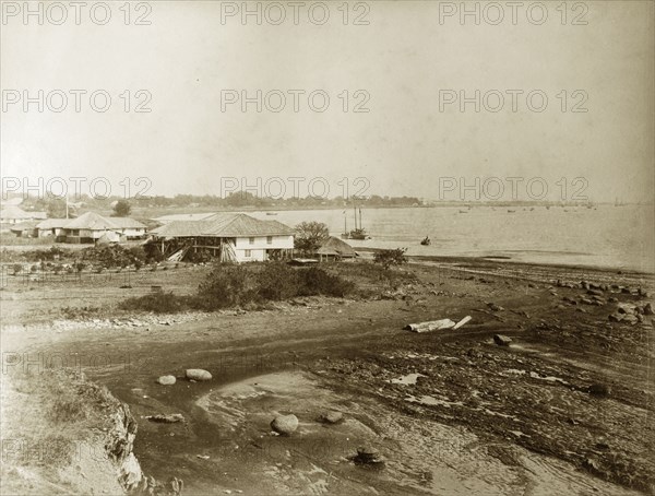 Near 'The Point', Burma (Myanmar). A rough track runs from 'The Point', a projecting spit of land in Sittwe, towards houses on the coast. Sittwe, Burma (Myanmar), circa 1895. Sittwe, Rakhine, Burma (Myanmar), South East Asia, Asia.