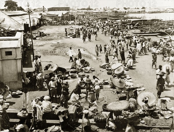 Market at Ebute Ero, Nigeria. Market on the harbourside at Ebute Ero. Lagos, Nigeria, circa 1925. Lagos, Lagos, Nigeria, Western Africa, Africa.