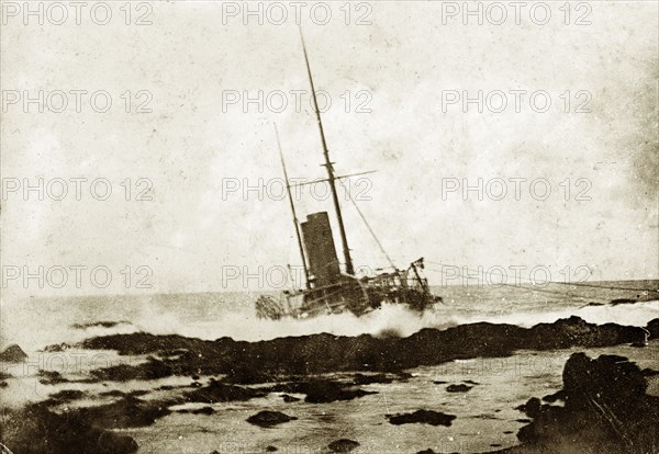 The wreck of RIMS 'Warren Hastings'. The stricken troopship RIMS 'Warren Hastings', on rocks off the coast of Reunion. Reunion, January 1897. Reunion (France), Indian Ocean, Africa.