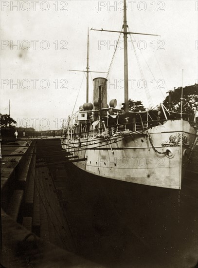 RIMS 'Mayo' in a dry dock. RIMS 'Mayo', a naval steamer belonging to the Royal Indian Marine Service, sits in a dry dock. Calcutta (Kolkata), India, circa 1900. Kolkata, West Bengal, India, Southern Asia, Asia.