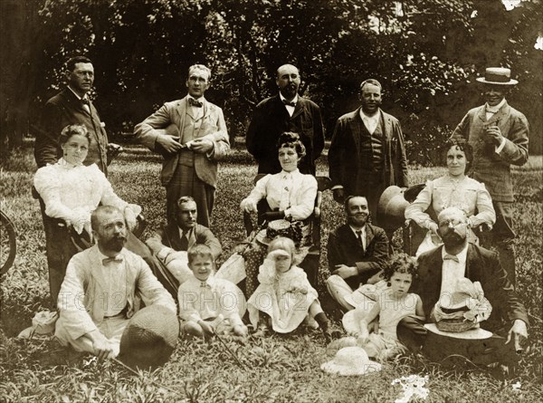 Edwardian families in Calcutta. Portrait of a group of British officers in the Royal Indian Marine Service and their families. Calcutta (Kolkata), India, 1903. Kolkata, West Bengal, India, Southern Asia, Asia.