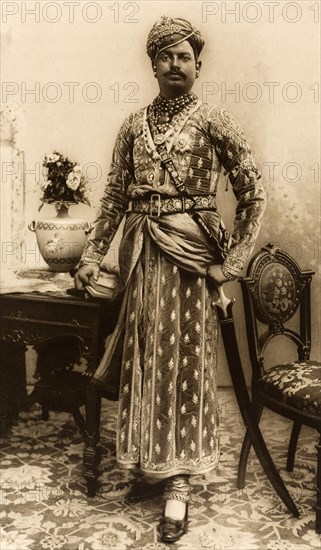 Maharao of Kota. Studio portrait of Sir Umed Singh (1873-1940), Maharao of Kota, dressed in his robes for the Coronation Durbar at Delhi. India, circa 1902. India, Southern Asia, Asia.