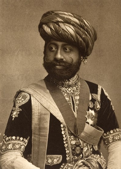 Sir Waghji Ravaj. Half-length studio portrait of Sir Waghji Ravaji (1858-1922), Thakur Sahib of Morvi, finely dressed for the Coronation Durbar at Delhi. India, circa 1902. India, Southern Asia, Asia.