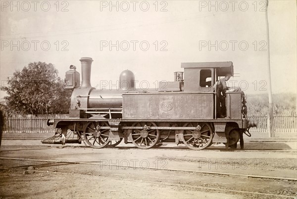 British steam locomotive, Jamaica. A British-manufactured steam locomotive sits on rails at a siding. A plaque on its side reads: 'Jamaica Railway 2', followed by a date which appears to read '1879'. Jamaica, circa 1895. Jamaica, Caribbean, North America .