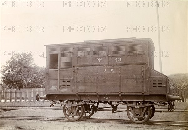 Jamaica Railway wagon. An upright railway wagon inscribed 'J. R. No.43', sits on rails at a siding. Jamaica, circa 1895. Jamaica, Caribbean, North America .