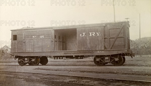 Jamaica Railway wagon. A railway wagon inscribed 'J. RY. No.46', sits on rails at a siding. Jamaica, circa 1895. Jamaica, Caribbean, North America .