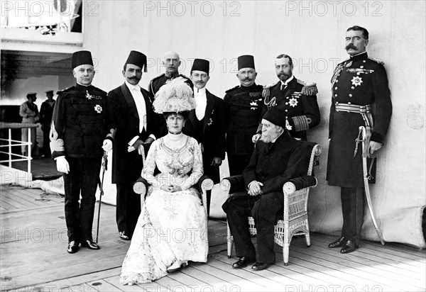 Dignitaries aboard HMS Medina. King George V (r.1910-36) and Queen Mary with Kiamil Pasha, Lord Kitchener, the Khedive of Egypt and other dignitaries aboard HMS Medina. The royal couple were on their way to India for the Coronation Durbar at Delhi. Port Said, Egypt, 21 November 1911. Port Said, Port Said, Egypt, Northern Africa, Africa.