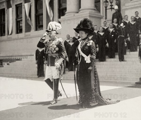 Duke and Duchess of Connaught at Cape Town. The Duke and Duchess of Connaught leave Cape Town's Houses of Parliament along a red carpet following the opening ceremony of the new Union Parliament. Cape Town, Cape Province (West Cape), South Africa, 4 November 1910. Cape Town, West Cape, South Africa, Southern Africa, Africa.