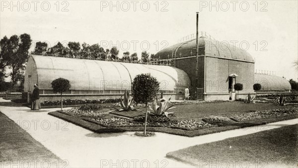 Greenhouses at Nouzha Gardens. Greenhouses in the formal Nouzha Gardens. Alexandria, Egypt, circa 1925., Alexandria, Egypt, Northern Africa, Africa.
