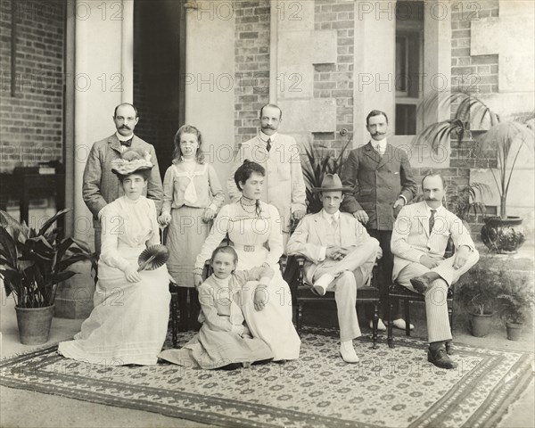 Sir Arthur Lawley with friends and family. Group portrait of Sir Arthur Lawley (back row, second from right) with family and friends on the veranda of Government House. Amongst the group are Lady Annie Lawley (front row, third from left) and the first Governor General of Australia, the Earl of Hopetoun (front row, second from right). Perth, Australia, circa 1901. Perth, West Australia, Australia, Australia, Oceania.