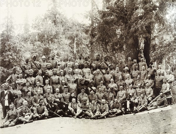 School of Musketry at Changla Gali. British and Indian infantry personnel from the School of Musketry assemble outdoors for a group portrait. The school was established at Changla Gali in 1888. Changla Gali, Punjab, India (Punjab, Pakistan), circa 1900. Changla Gali, Punjab, Pakistan, Southern Asia, Asia.