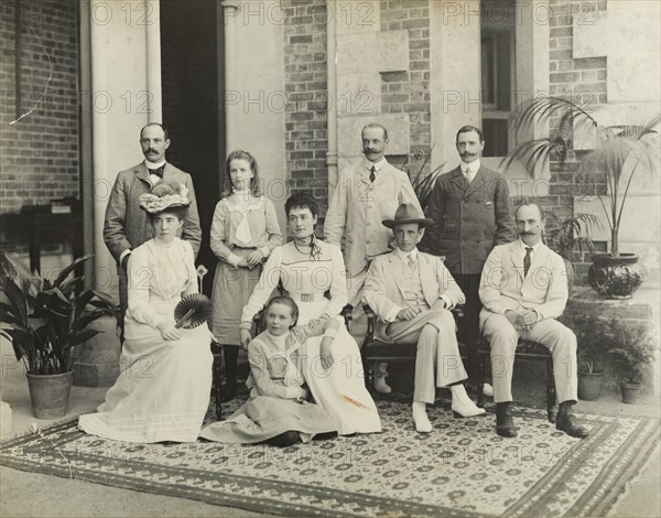 The Lawley family and friends. Group portrait of Sir Arthur Lawley (back row, second from right) with family and friends on the veranda of Government House. Amongst the group are Lady Annie Lawley (front row, third from left) and the first Governor General of Australia, the Earl of Hopetoun (front row, second from right). Perth, Australia, circa 1901. Perth, West Australia, Australia, Australia, Oceania.