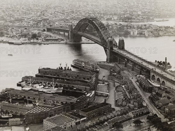 Sydney Harbour Bridge. View of Sydney Harbour Bridge, stretching across Port Jackson to connect Dawes Point and Milsons Point. Sydney, Australia, circa January 1946. Sydney, New South Wales, Australia, Australia, Oceania.