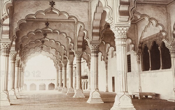 Interior of the Diwan-i-Am at Agra Fort. Interior view of the Diwan-i-Am (Hall of Public Audience) at Agra Fort, an ornate colonnade decorated with lobed archways where the Emperor would have received his public and heard their petitions. Agra, United Provinces (Uttar Pradesh), India, circa 1922. Agra, Uttar Pradesh, India, Southern Asia, Asia.