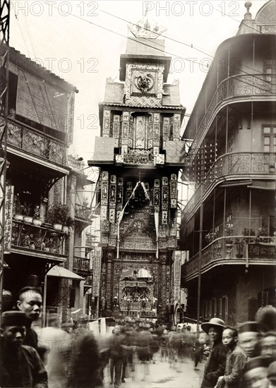 Welcome arch for the Duke of Connaught, Hong Kong. A decorative welcome arch spans a city street in honour of the Duke of Connaught, who visited Hong Kong shortly before a devastating typhoon struck the city on 18 September. Hong Kong, China, August 1906. Hong Kong, Hong Kong, China, People's Republic of, Eastern Asia, Asia.