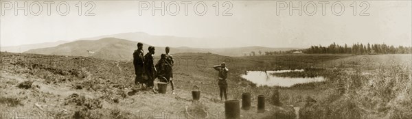 African women collecting water, South Africa. Five African women stand by pots placed on the ground, whilst collecting water at a waterhole. Eastern Transvaal (Mpumalanga), South Africa, 1903., Mpumalanga, South Africa, Southern Africa, Africa.