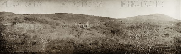 Construction of a bridge, South Africa. Three horsemen ride down to a ford to view the construction site of a bridge being built to connect Pilgrim's Rest and Lydenburg. Bell tents belonging to the construction site line a hill in the distance. Pilgrim's Rest, Eastern Transvaal (Mpumalanga), South Africa, 1903. Lydenburg, Mpumalanga, South Africa, Southern Africa, Africa.