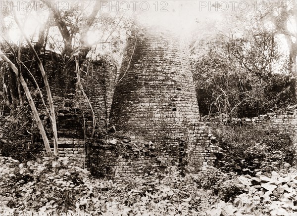 Ruins of Great Zimbabwe. The remains of a conical stone tower at the ruined city of Great Zimbabwe, a settlement dating from between the 11th and 15th centuries. Rhodesia (Zimbabwe), circa 1897. Zimbabwe, Southern Africa, Africa.