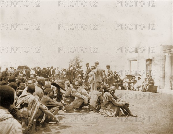 An indaba at Government house. Matabele (Ndebele) indunas (chiefs) and British administrators attend an indaba (council) at Government House. Bulawayo, Rhodesia (Zimbabwe), November 1897. Bulawayo, Matabeleland North, Zimbabwe, Southern Africa, Africa.