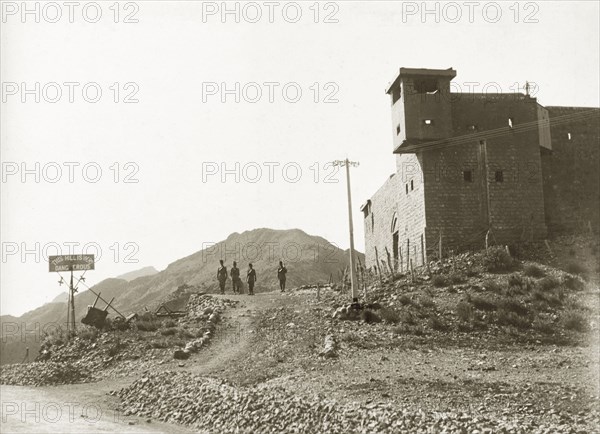 Frontier Constabulary post at Kohat Pass. Four armed policeman of the Frontier Constabulary guard a fortified British check point at Kohat Pass, the road connecting Kohat to Peshawar. Kohat, North West Frontier Province, India (Pakistan), circa 1927. Kohat, North West Frontier Province, Pakistan, Southern Asia, Asia.