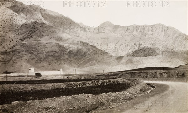 Tribal Towers' at the Khyber Pass. A fortified building, referred to by an original caption as 'Tribal Towers', sits beside the Khyber Pass, a strategically important route in the Safed Koh Mountains, connecting British India (now Pakistan) with Afghanistan. Landi Khana, North West Frontier Province, India (Pakistan), circa 1924., North West Frontier Province, Pakistan, Southern Asia, Asia.