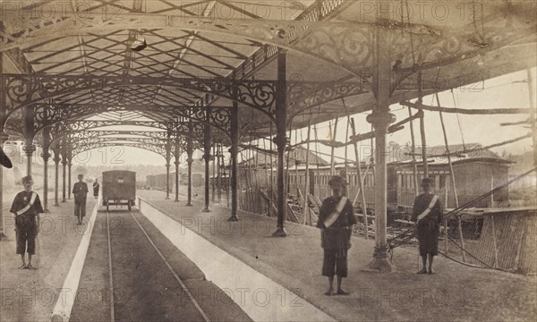 Colombo railway station. Station attendants stand on the platform as a train departs from Colombo station on the Ceylon Government Railway line. Colombo, Ceylon (Sri Lanka), circa 1865. Colombo, West (Sri Lanka), Sri Lanka, Southern Asia, Asia.