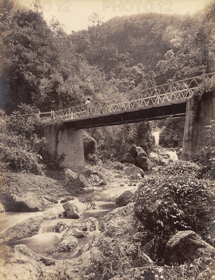 Road bridge across the Hope River. The Hope River runs belows a road bridge in the mountains. St Andrew, Jamaica, circa 1891., St Andrew (Jamaica), Jamaica, Caribbean, North America .