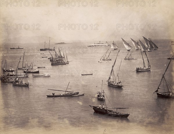 Regatta at Bombay harbour. Sailing boats take part in a regatta at Bombay harbour. Bombay (Mumbai), Maharastra, India, 1883. Mumbai, Maharashtra, India, Southern Asia, Asia.