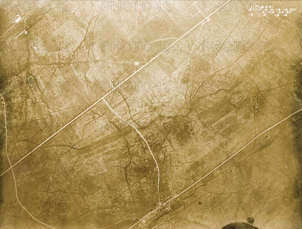 Aerial view of trenches near Deslimont Farm. One of a series of British aerial reconnaissance photographs recording the positions of trenches on the Western Front during the First World War. Complex trench systems run across the landscape near to a farmstead (top) identified as 'Deslimont Farm'. Nord-Pas de Calais or Picardie, France, 18 March 1918., Nord-Pas de Calais, France, Western Europe, Europe .