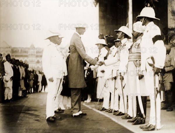 Lord Irwin's arrival at Bombay. Lord Irwin, Viceroy of India, is accompanied by Sir Henry Staveley Lawrence, the Acting Governor of Bombay, as he shakes hands with Indian and British officials on arriving in Bombay. Bombay (Mumbai), India, 1926. Mumbai, Maharashtra, India, Southern Asia, Asia.