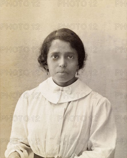 Portrait of Nannie. Portrait of an Indian ayah (nursemaid) called Nannie, aged around 20 years. Nannie worked for a British family (the Lawrences) in India, later moving with them to England where she lived for the rest of her life. Location unknown, circa 1910. England (United Kingdom), Western Europe, Europe .