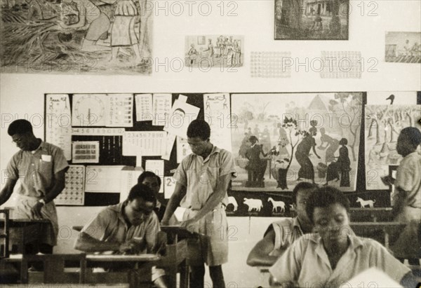 Art class at a teacher training college. Male students work at their desks during an art class at a teacher training college. Asante, Gold Coast (Ghana), circa 1950., Ashanti, Ghana, Western Africa, Africa.