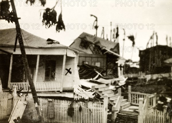 Houses destroyed by hurricane, Belize City. Houses are reduced to rubble by a hurricane that hit Belize City on 10 September 1931, destroying two-thirds of the buildings and killing over 1000 people. Belize City, Belize, September 1931. Belize, Belize, Belize, Central America, North America .