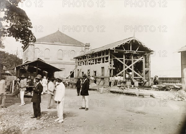 Extension work at Port of Spain railway station. The third class railway station is removed during extension work at the Trinidad Government Railway terminal at Port of Spain. Port of Spain, Trinidad, 10 June 1914. Port of Spain, Trinidad and Tobago, Trinidad and Tobago, Caribbean, North America .