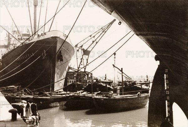 The docks at Calcutta. View of ships and boats moored at the docks in Calcutta. Calcutta (Kolkata), India, 1930. Kolkata, West Bengal, India, Southern Asia, Asia.