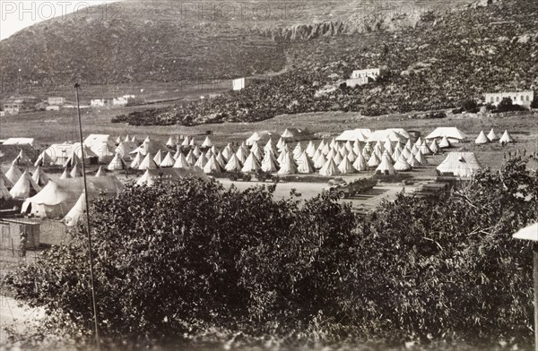 Camp of the First Battalion Irish Guards, Nablus. Lines of army bell tents are pitched at Nablus, at a military camp belonging to the First Battalion Irish Guards. During the period of the Great Uprising (1936-39), an additional 20,000 British troops were deployed to Palestine in an attempt to clamp down on Arab dissidence. Nablus, British Mandate of Palestine (West Bank, Middle East), circa 1938. Nablus, West Bank, West Bank (Palestine), Middle East, Asia.