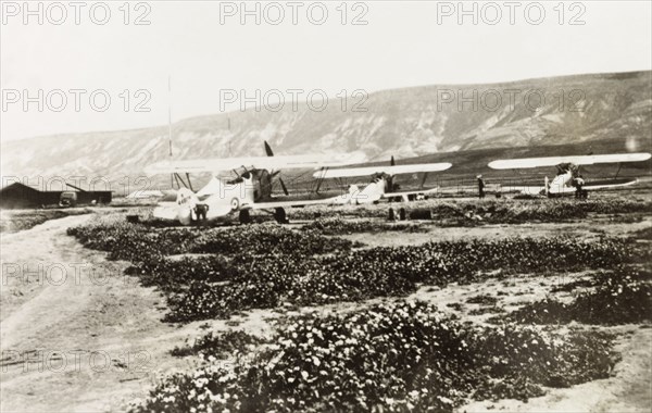 Royal Air Force biplanes, Palestine. Three Royal Air Force biplanes sit in an airfield in northern Palestine. British Mandate of Palestine (Middle East), circa 1938., Middle East, Asia.