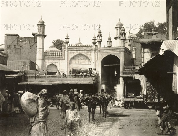 Mohabbat Khan Mosque, Peshawar. View from Andar Sheher bazaar to Mohabbat Khan Mosque, a 17th century mosque named after Nawab Mohabbat Khan, a Mughal governor of Peshawar. Peshawar, India (Pakistan), February 1903. Peshawar, North West Frontier Province, Pakistan, Southern Asia, Asia.