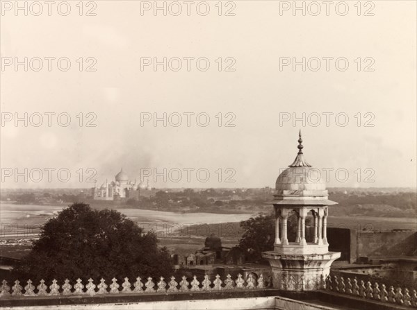 View from Moti Masjid, Agra. Distant view of the Taj Mahal taken from the Moti Masjid (Pearl Mosque) at the Agra fort complex. Agra, India, December 1902. Agra, Uttar Pradesh, India, Southern Asia, Asia.