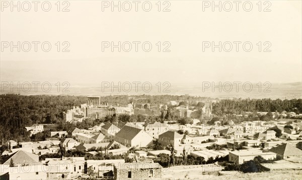 View across Baalbek. View across Baalbek, looking towards the Corinthian columns of the town's famous Roman ruins. Baalbek, French Mandate of Lebanon (Lebanon), July 1941. Baalbek, Beqaa, Lebanon, Middle East, Asia.