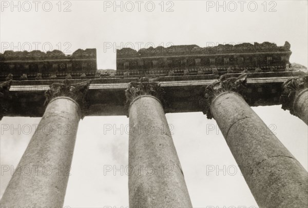 Corinthian columns at Baalbek. Upward view of the Corinthian columns at Baalbek, once one of the largest colonies in the Roman Empire and originally known as Heliopolis. Baalbek, French Mandate of Lebanon (Lebanon), April 1944. Baalbek, Beqaa, Lebanon, Middle East, Asia.